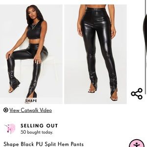 Black split hem pants